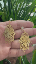 Load and play video in Gallery viewer, Raw Brass Hamsa Earrings
